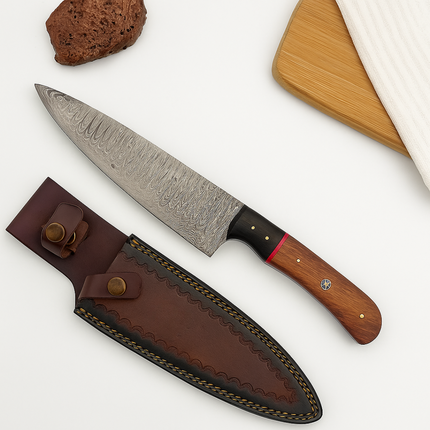 Knife with wooden handle and leather sheath on a white background